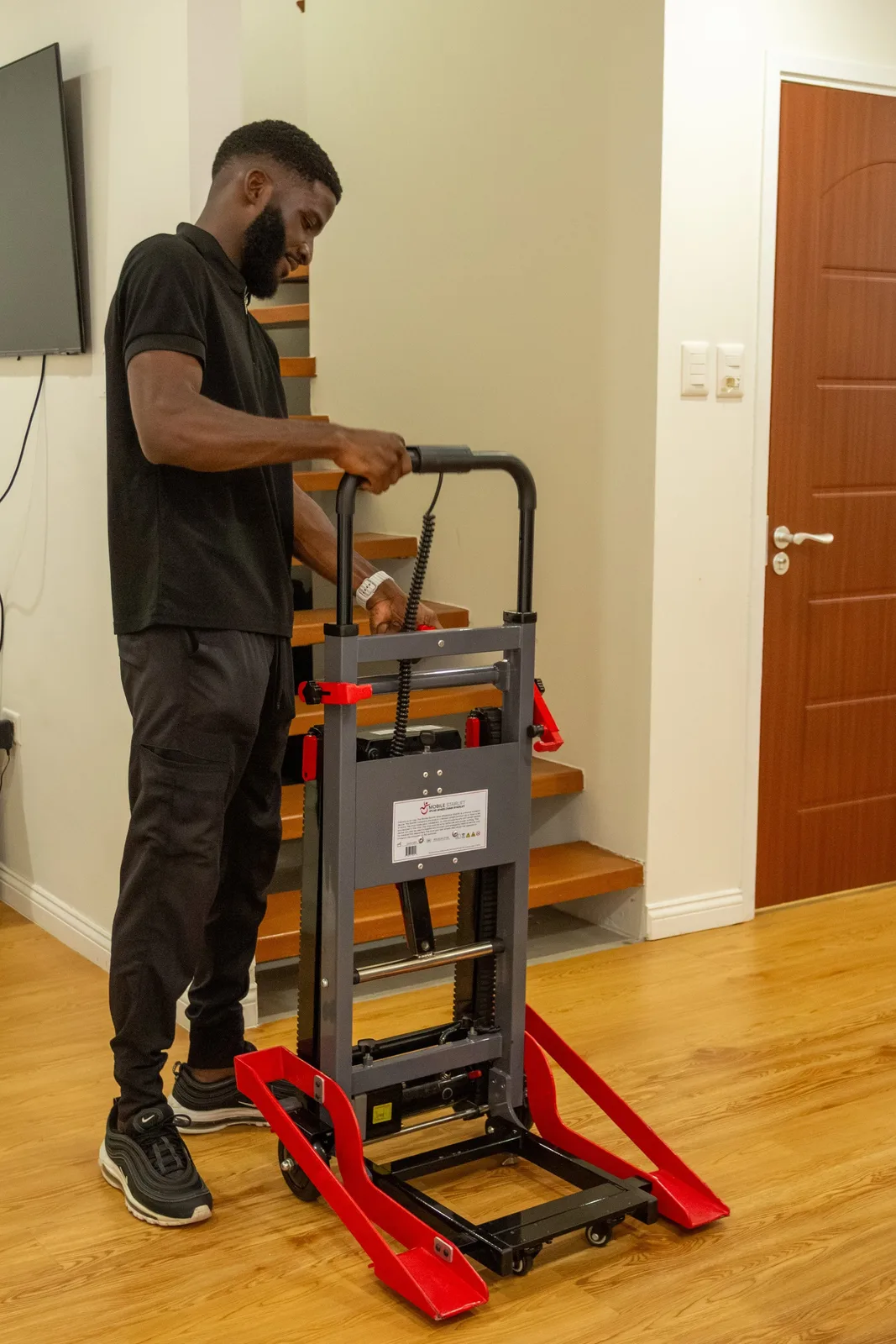 Wellness Express mobile stairclimber being prepared beside a staircase
